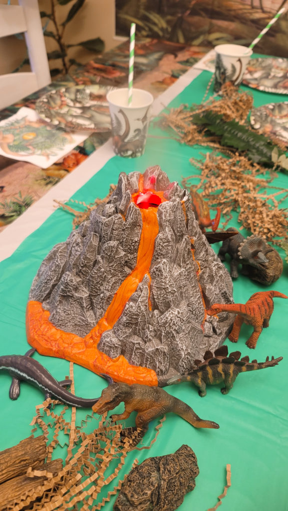 steaming volcano toy on tablescape