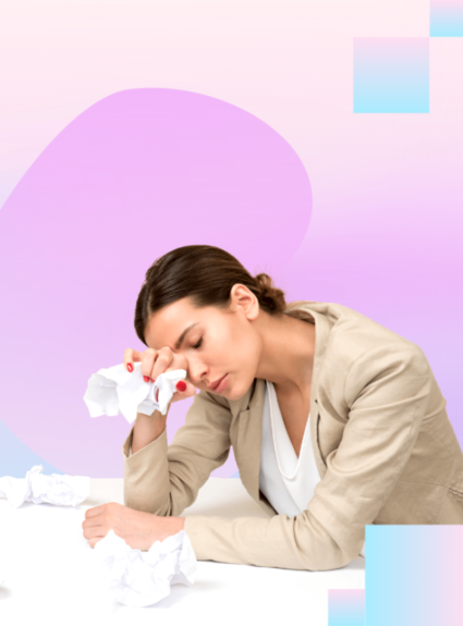 girl with head down holding tissue